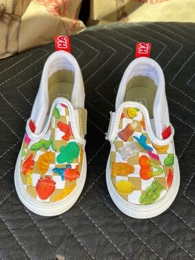 Vans Kids Slip-On Sneakers in White with Multicolor Candy Print